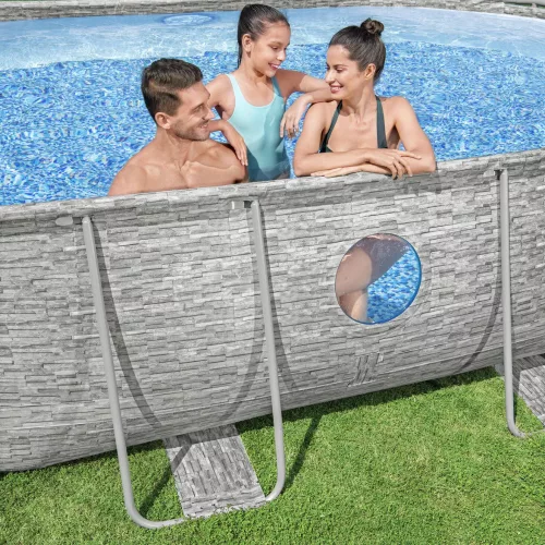 Bestway ARUBA rattan hatású fémvázas ovális medence szett ablakkal 488 x 305 x 107 cm